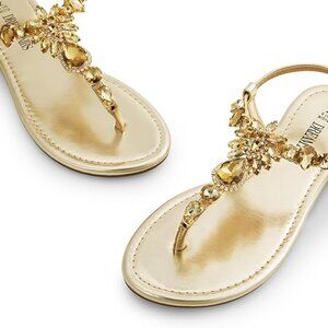 Flat gold sandals